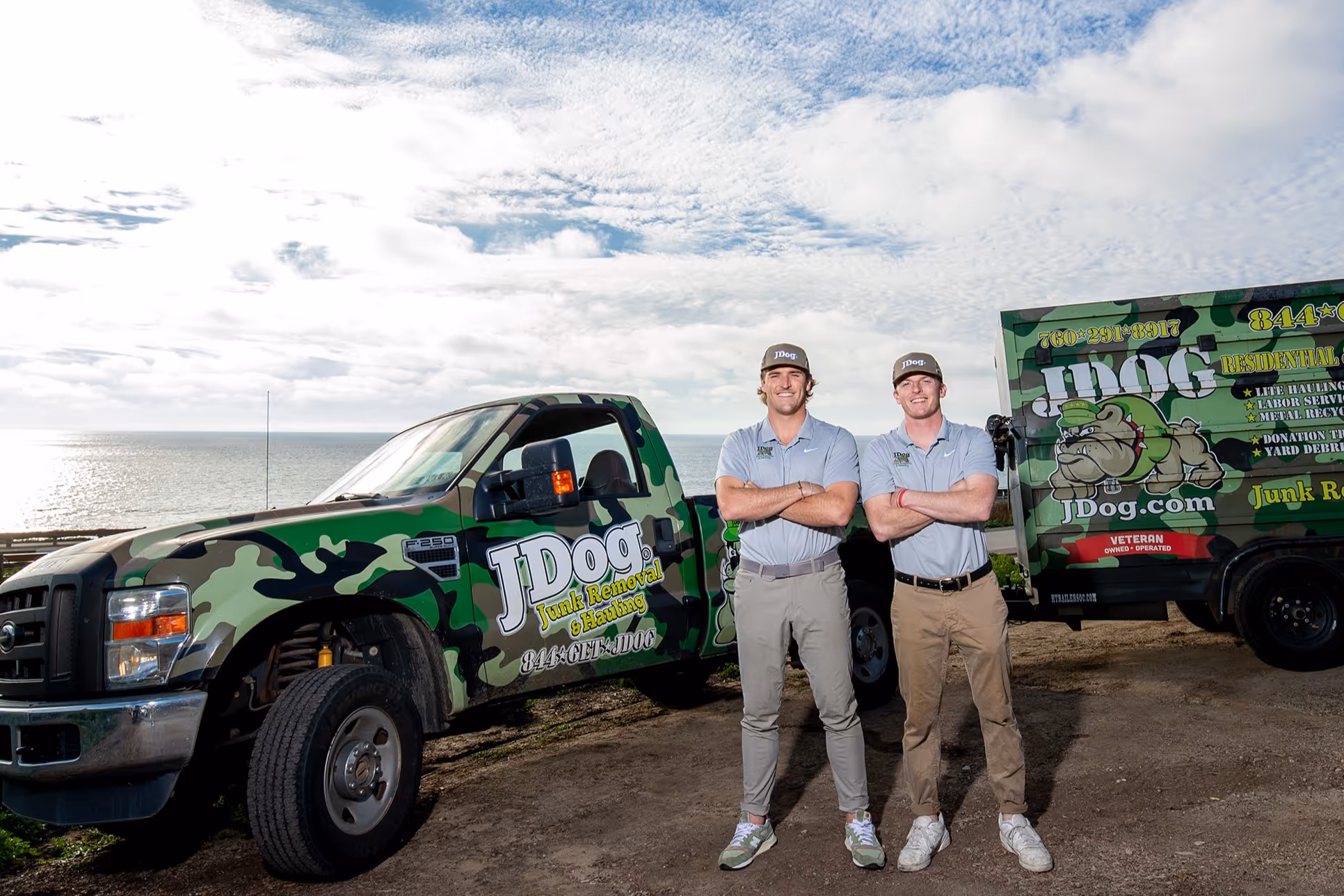 Ryan and Scott posing with a demolished wall.